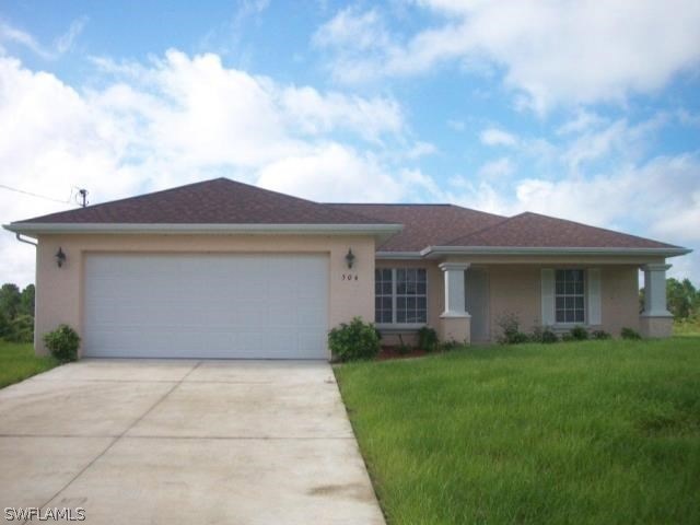 504 Ames St E, Lehigh Acres, FL 33974 - photo 1