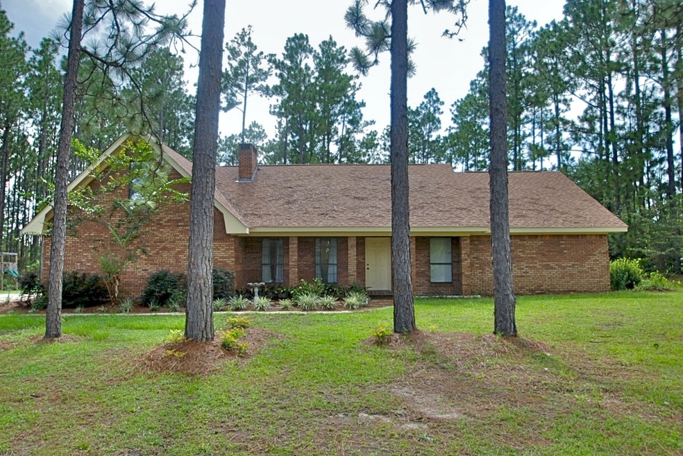 23 Mackeral Drive on large wooded lot