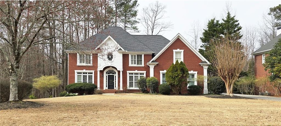 View of front of home featuring a front lawn