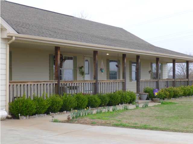 Welcome to the country, this porch is the length o