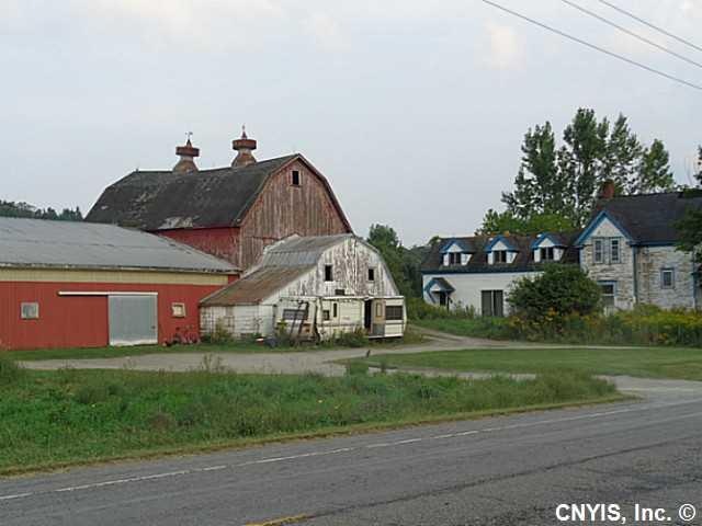 Exterior Front. Large barn fronts 46.71 acres of l