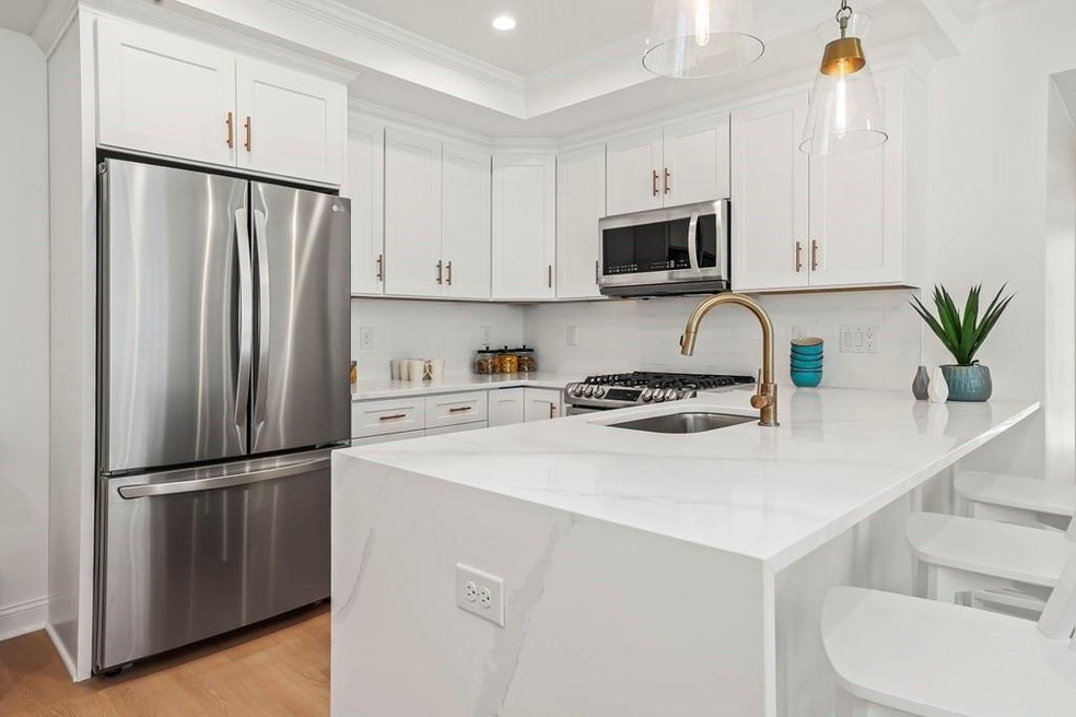 67 Cummins Hwy unit 303, Roslindale, MA 02131 - photo 1