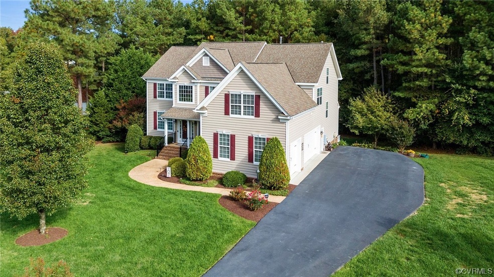 View of front of house featuring a garage and a fr