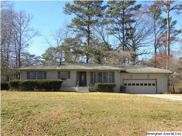 Painted brick-great curb appeal-beautiful lot