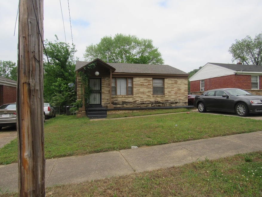 Bungalow-style house with a front lawn, roof with shingles, and brick siding