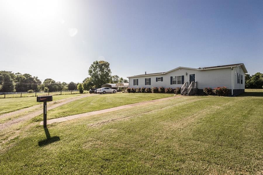 Front/side of this great home, off the road for a little privacy