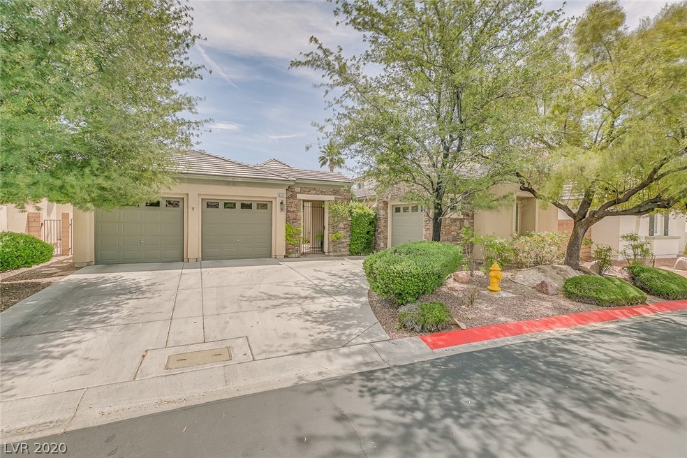 Front View Of The Gated Entry Home With A 3 Car Ga