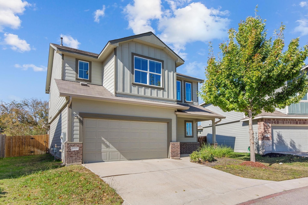 View of front of property with brick siding, an a