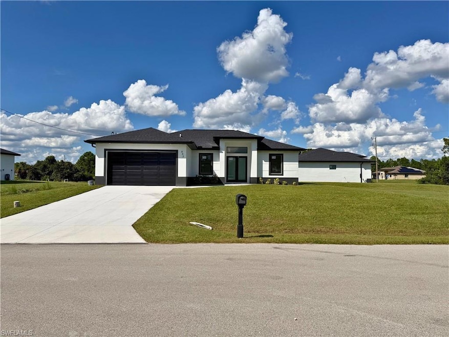643 Knapp St, Lehigh Acres, FL 33974 - photo 1