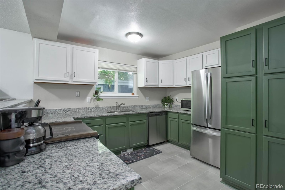 11593 E Cedar Ave, Aurora, CO 80012 - photo 1