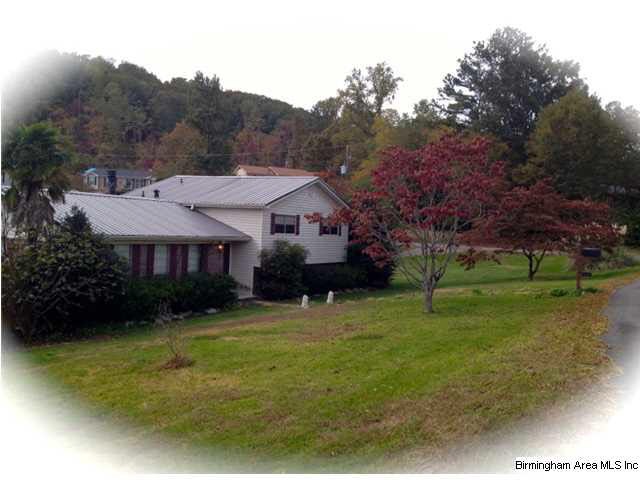 LARGE CORNER LOT, NEW roof and Siding.