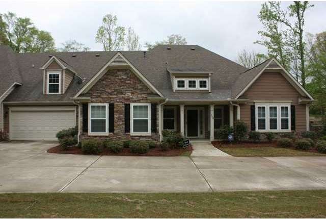 Exterior Front. Stacked stone accents.