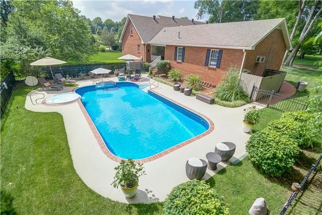 Welcome to 218 The Hollows Ct! Enjoy your own backyard oasis with the gorgeous in-ground salt water pool with 