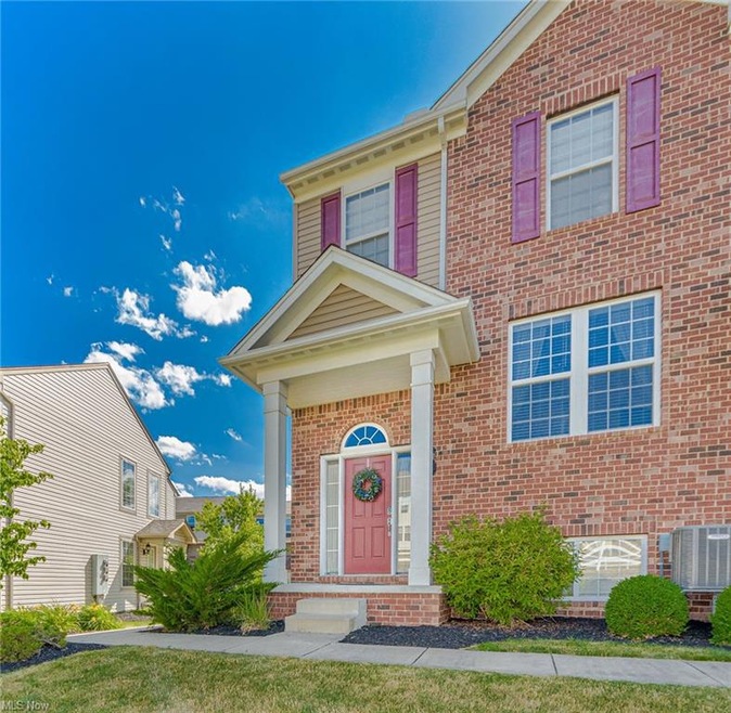 Welcome to 977 Croghan Way, a beautiful end unit t