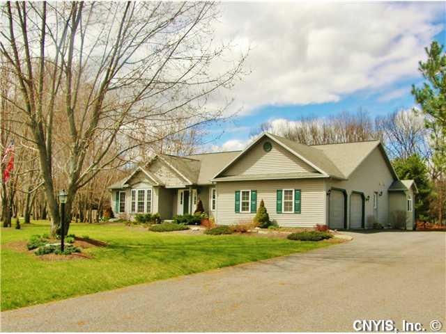 Exterior Front. Picturesque setting on a full acre