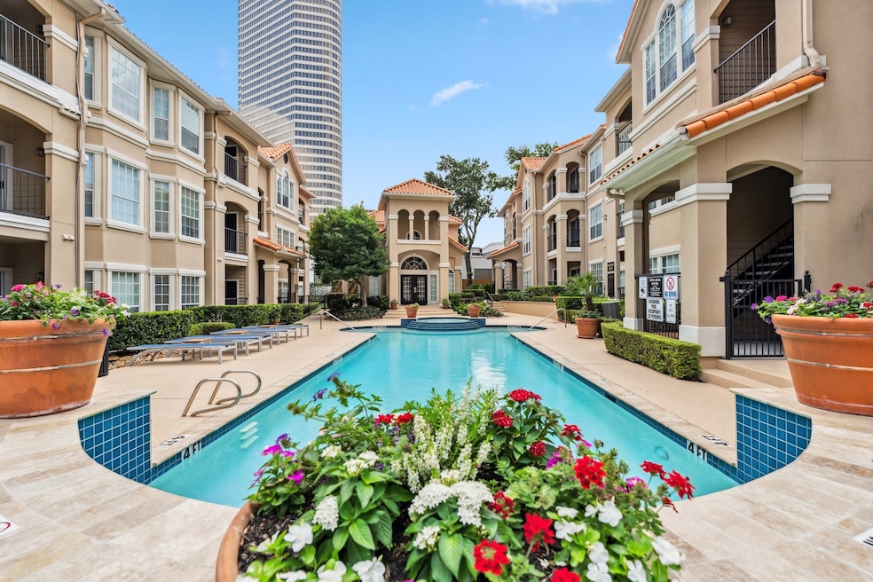 Resort-style pool at Reata at River Oaks with lush