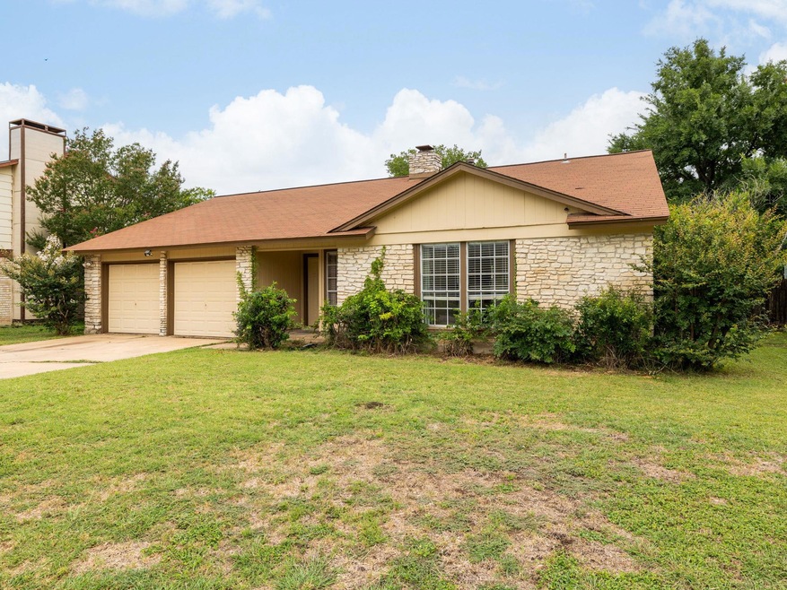 Ranch-style home featuring concrete driveway, a c
