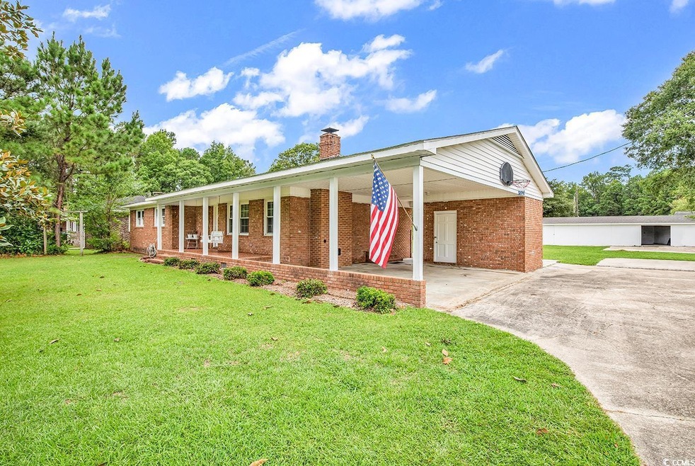 Single story home featuring covered porch and a fr