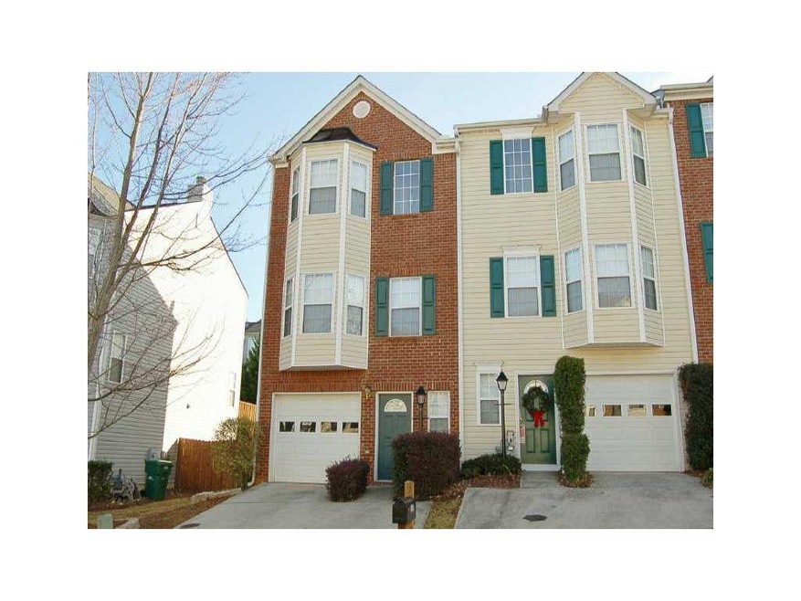Exterior Front. WELL MAINTAINED TOWNHOME IN GREAT 