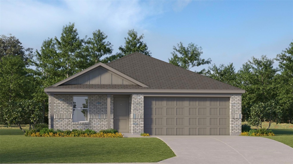 View of front of house featuring a garage and a fr