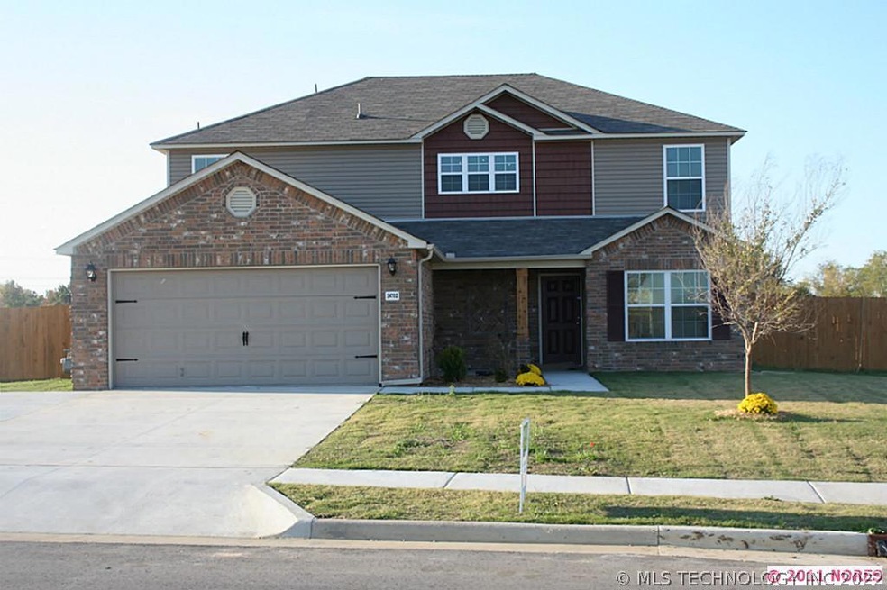 Corner homesite with 12' double gate.