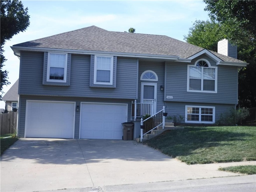 1612 W Pelham Path, Raymore, MO 64083 - photo 1