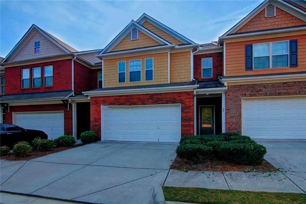 Multi unit property featuring an attached garage, 