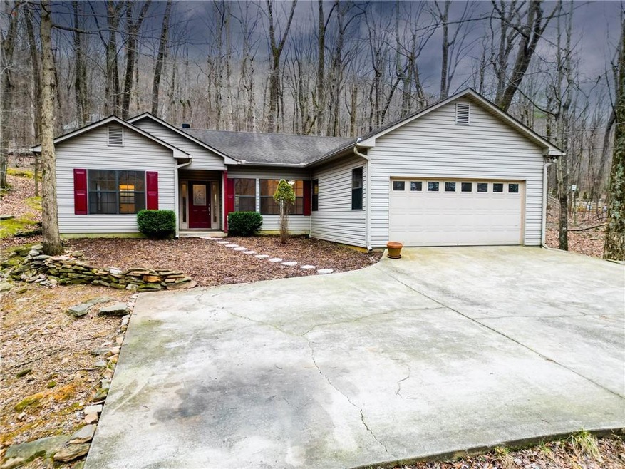 Ranch-style home featuring a garage