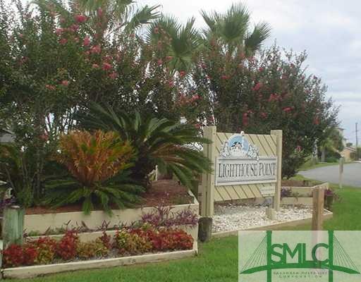 Exterior Front. Gated swim tennis complex on Tybee