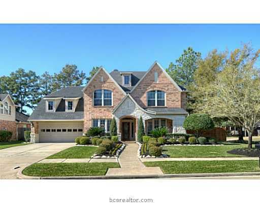 Exterior Front. Resting on a large corner lot, this home offers a thoughtful, open floorplan. From the towering living room ceilings, to the serene master bathroom, this David Weakley home is filled with unrivaled features.