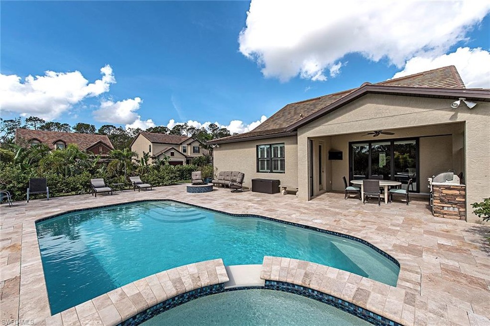 Gas firepit. Travertine deck.  Saltwater pool and 