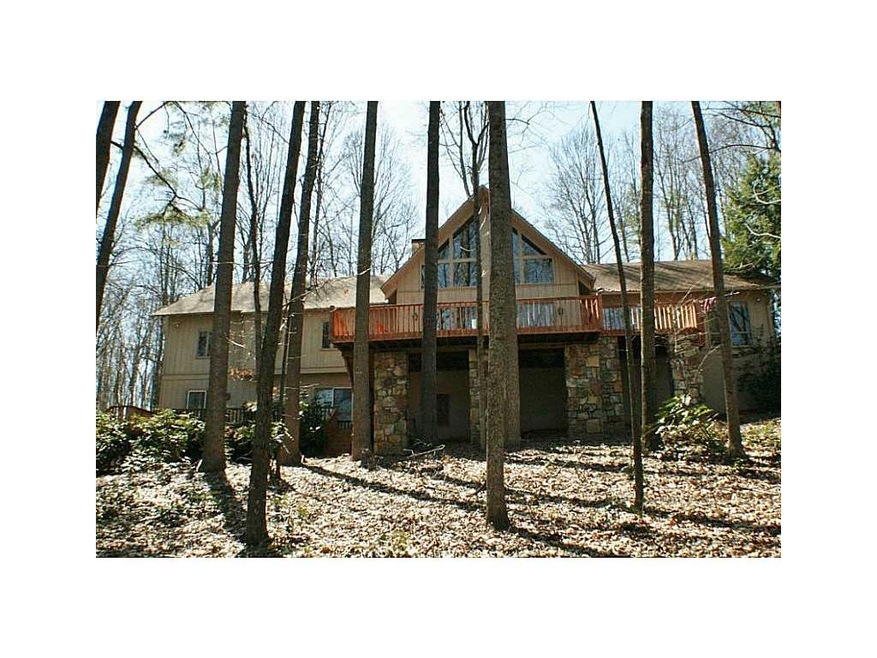 Exterior Front. THIS 5000+ SQ FT CUSTOM HOME IS LO