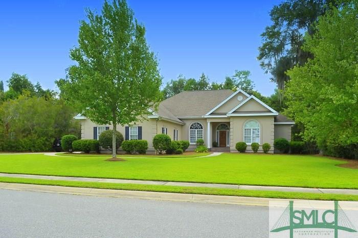 This hard coat stucco home is situated on a beauti
