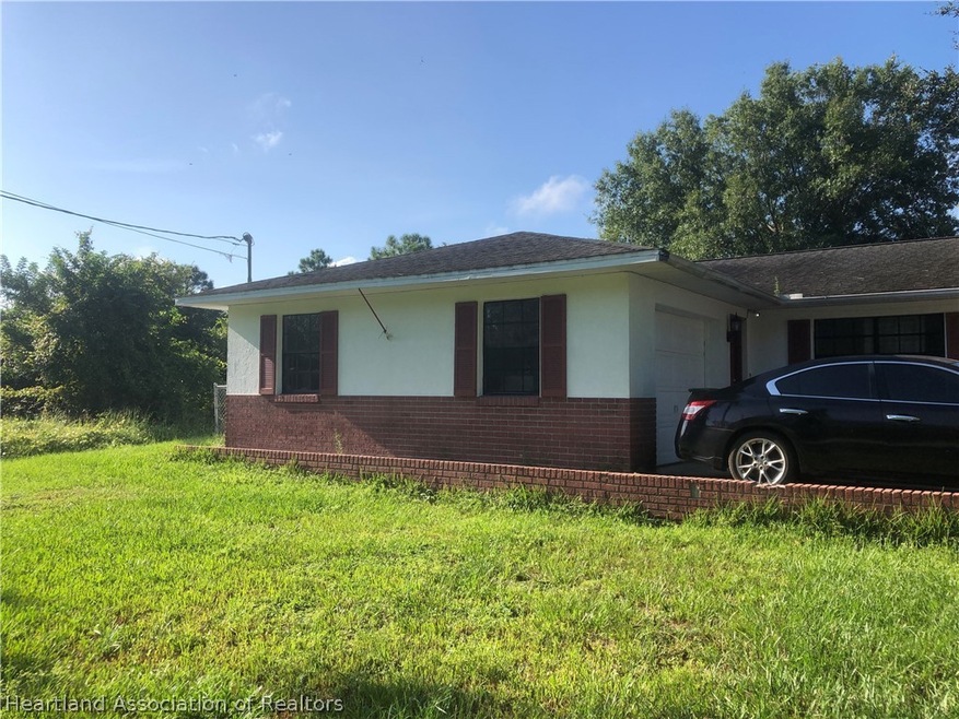 253 Moon Glow Ave, Lake Placid, FL 33852 - photo 1