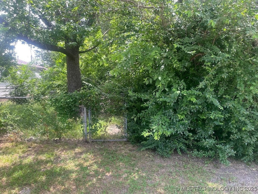 Front of Lot where gate is located.