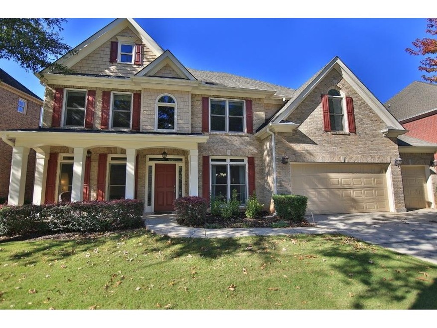 Four sided brick traditional with 3 car garage