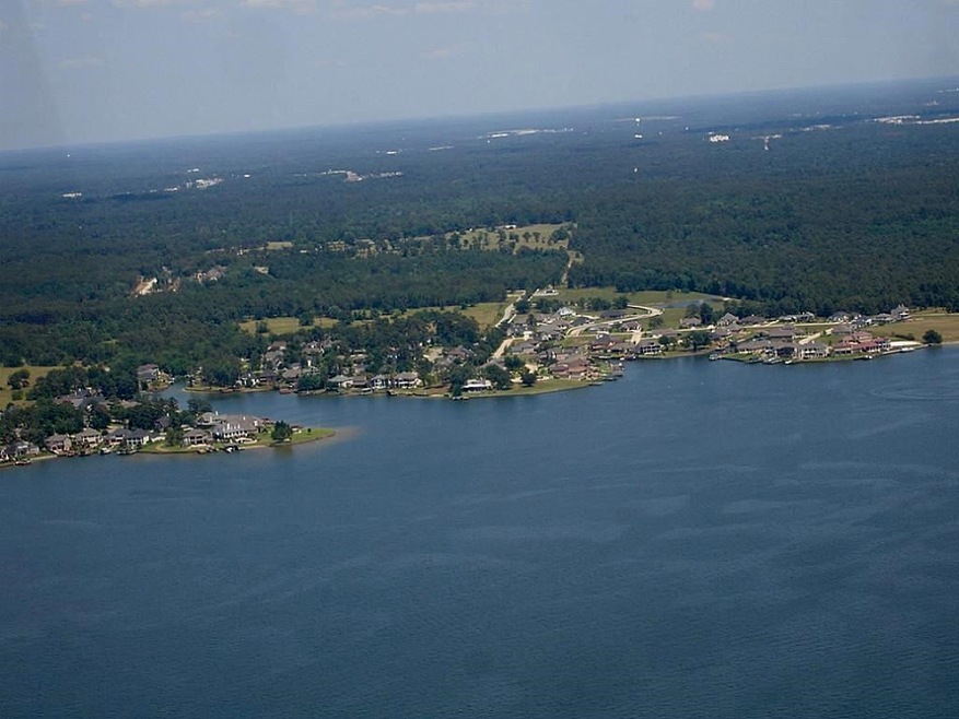 Aerial photo over Lake Conroe looking back towards the Longmire on Lake Conroe community