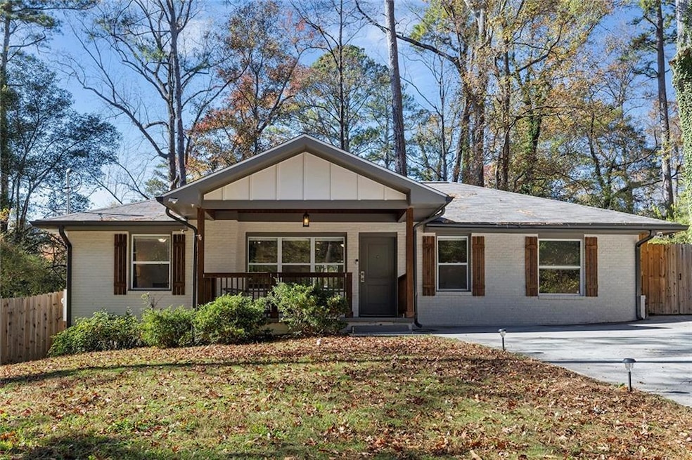 Ranch-style house with covered porch.