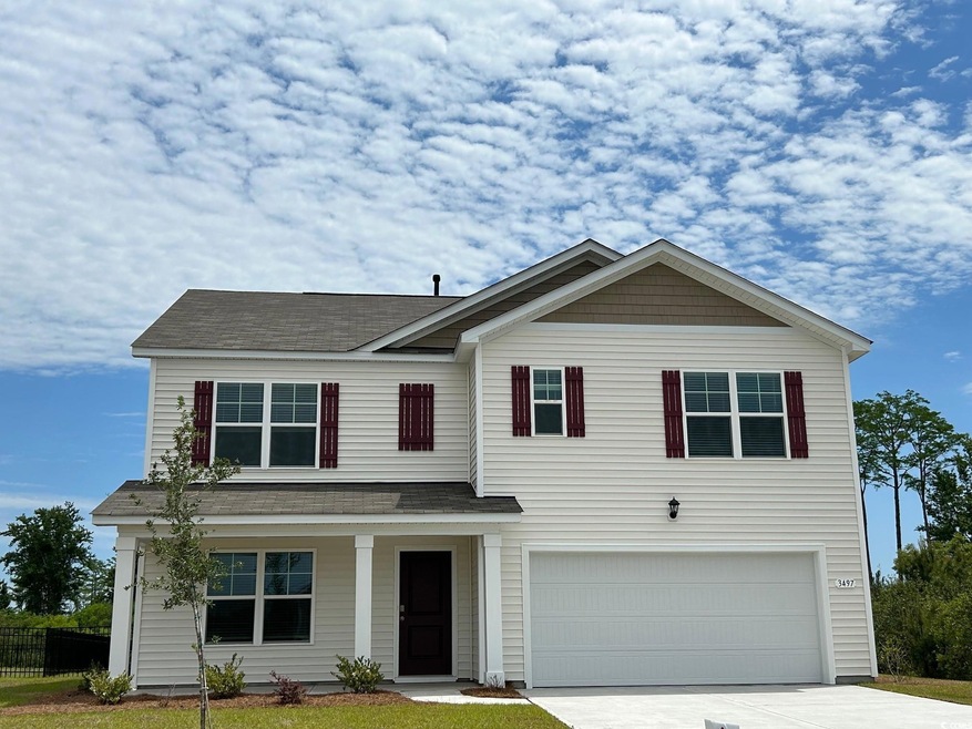 View of front of property with an attached garage,
