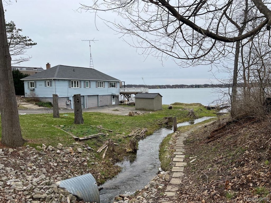 Drain/creek is on Township owned lot, Street