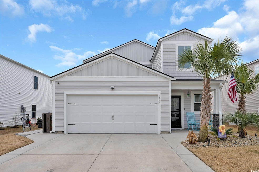 View of front of home with a garage
