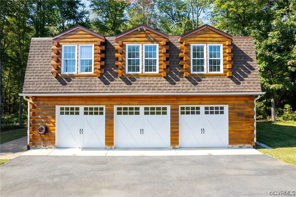 View of front of home featuring the garage