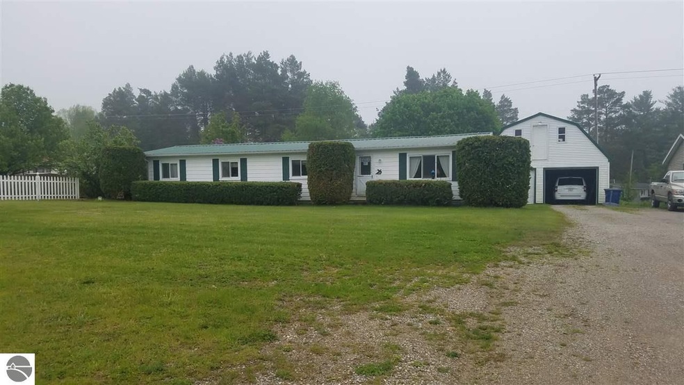 6465 M 55, Whittemore, MI 48770 - photo 1