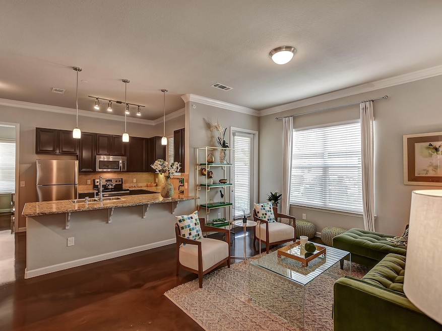 This photo features a modern open-concept living a