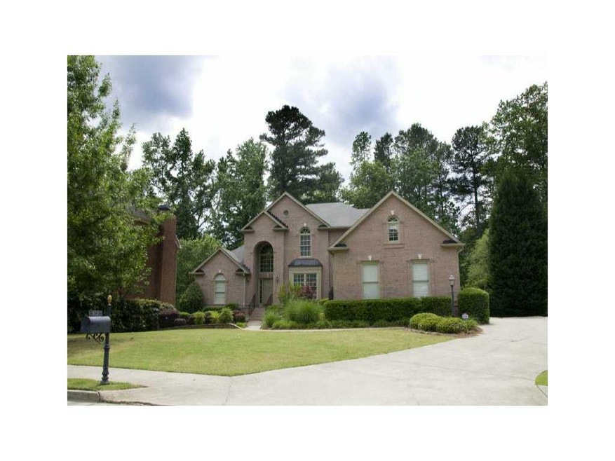 Exterior Front. Brick Three Car Garage Culdesac TO