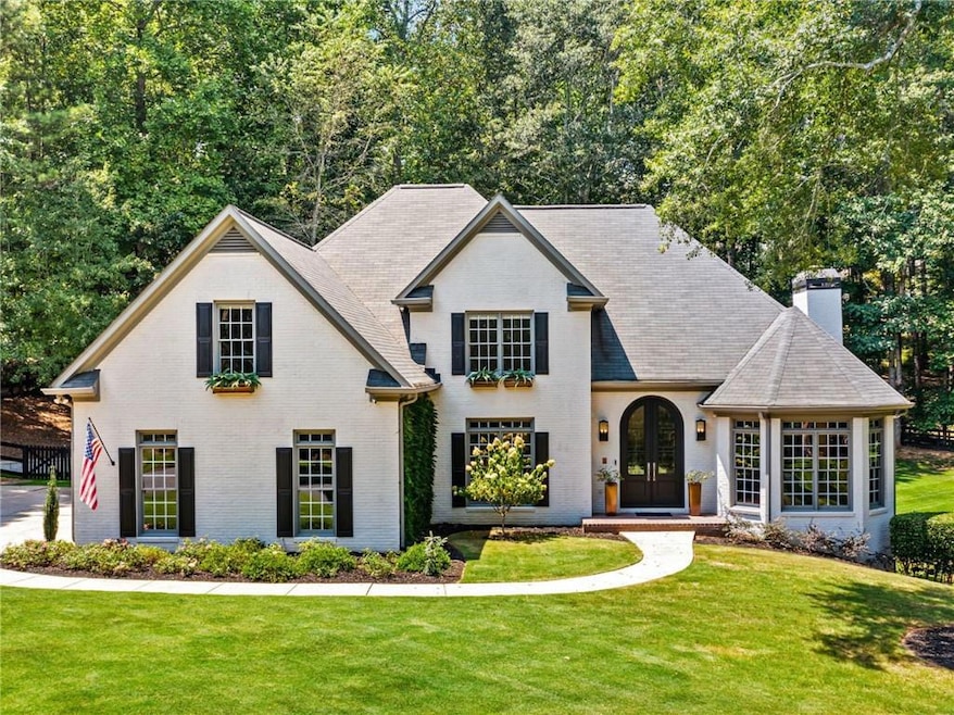 View of front of house with a front yard