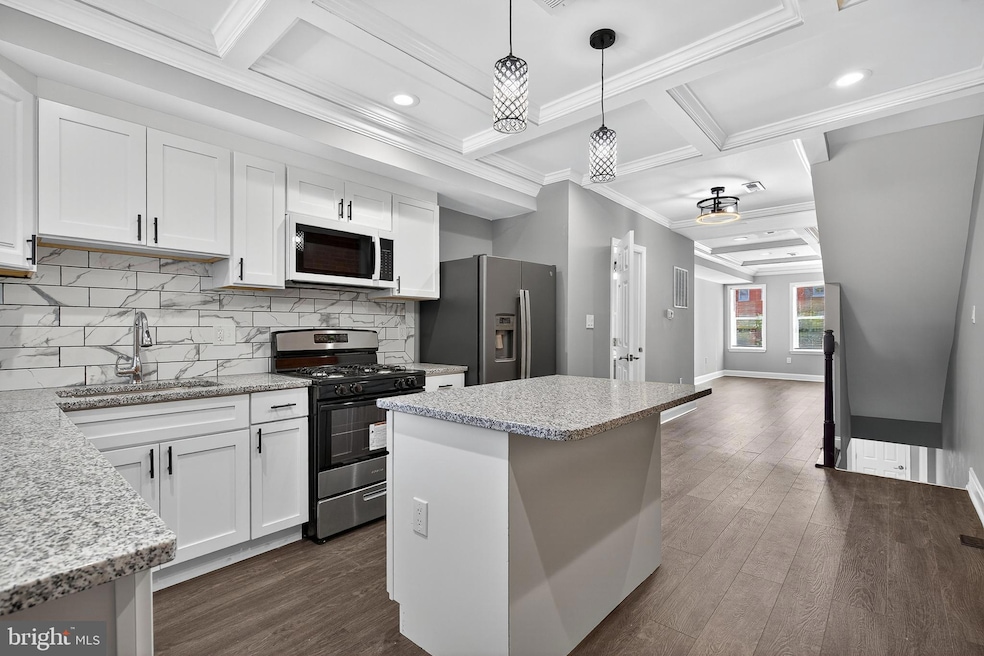 320 S Pulaski St, Baltimore, MD 21223 - photo 1