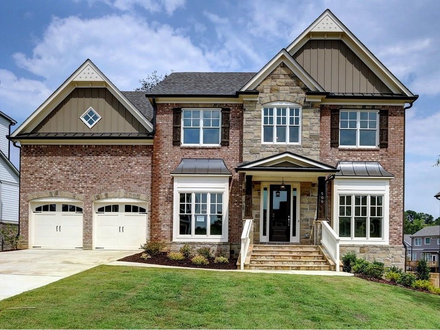 Beautiful custom brick and real stone exterior.