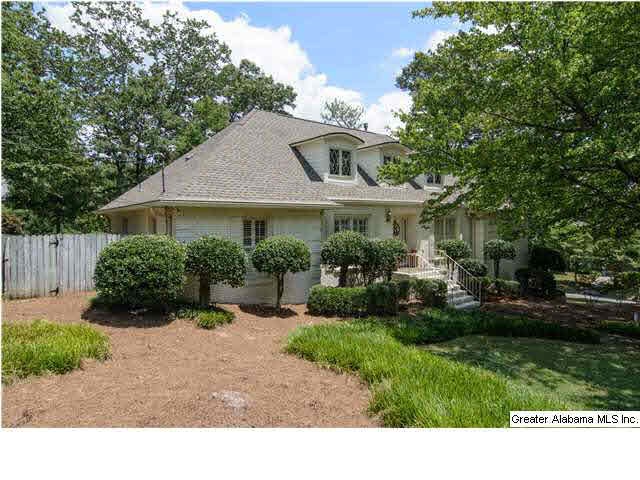 Front of painted brick home.