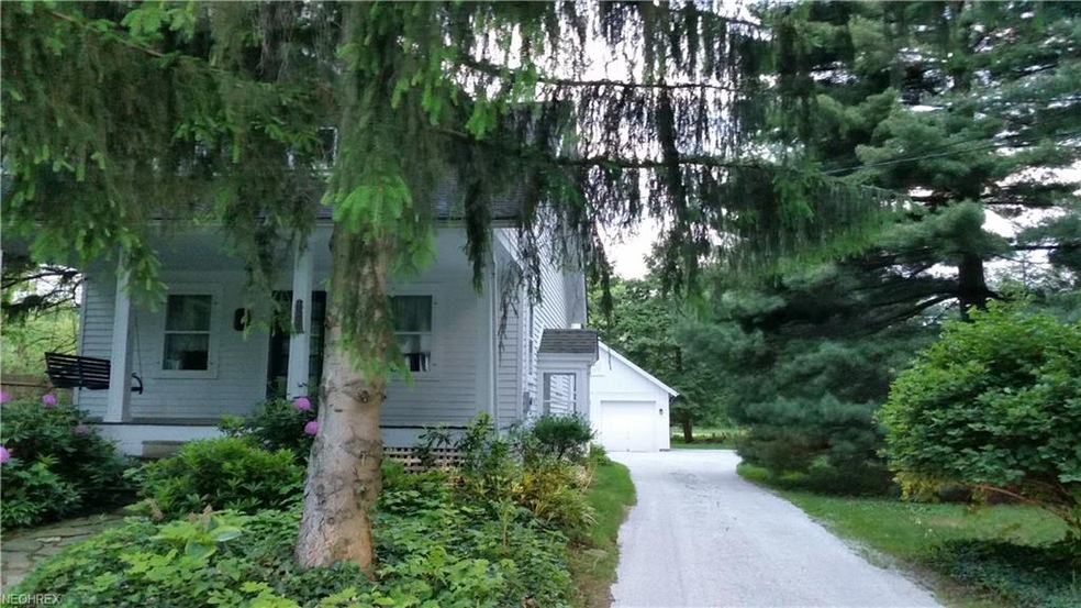 Front view showing large front porch.  The additio